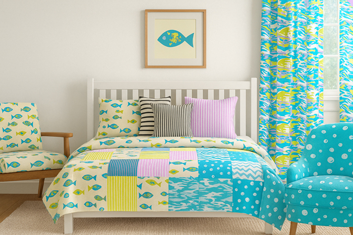 Bedroom with bright quilt, curtains, chairs